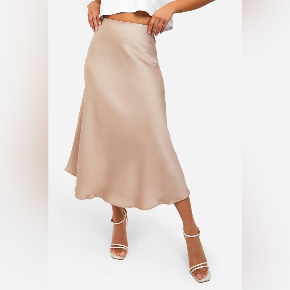 Stimma Silky midi skirt in a soft blush/nude shade.